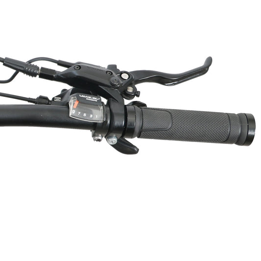 Close-up of a motorcycle handlebar with controls on a white background