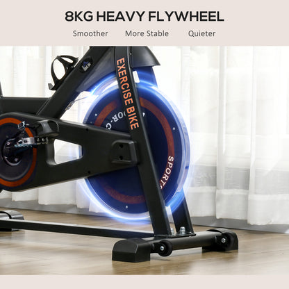 Exercise bike with 8KG heavy flywheel on a wooden floor.