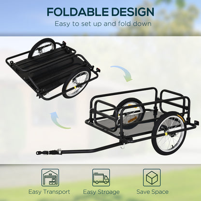Foldable bike trailer with wheels on a blurred outdoor background