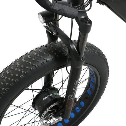 Close-up of a bicycle wheel with knobby tires on a white background