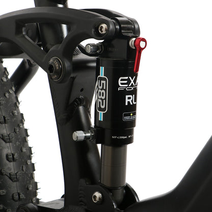 Close-up of a bicycle suspension fork with EXALIFT branding on a white background