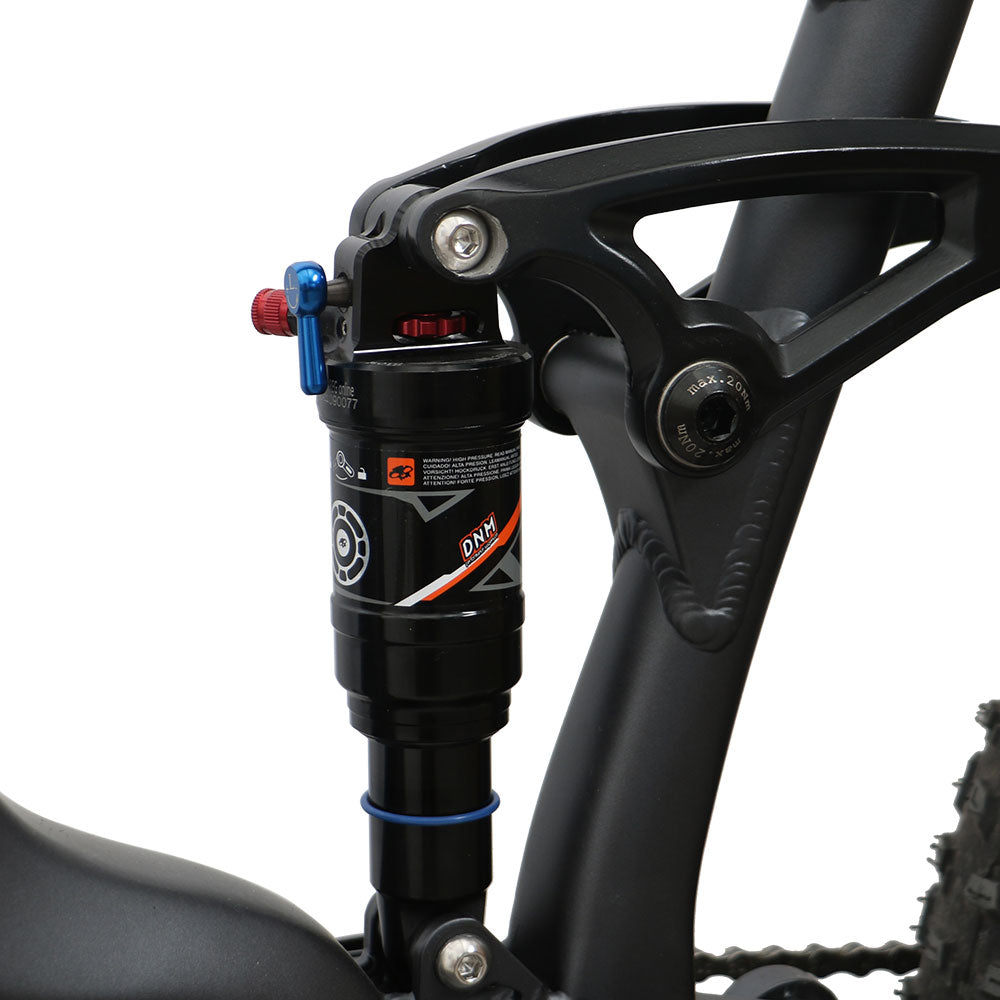 Close-up of a bicycle suspension fork with brand logo on a white background