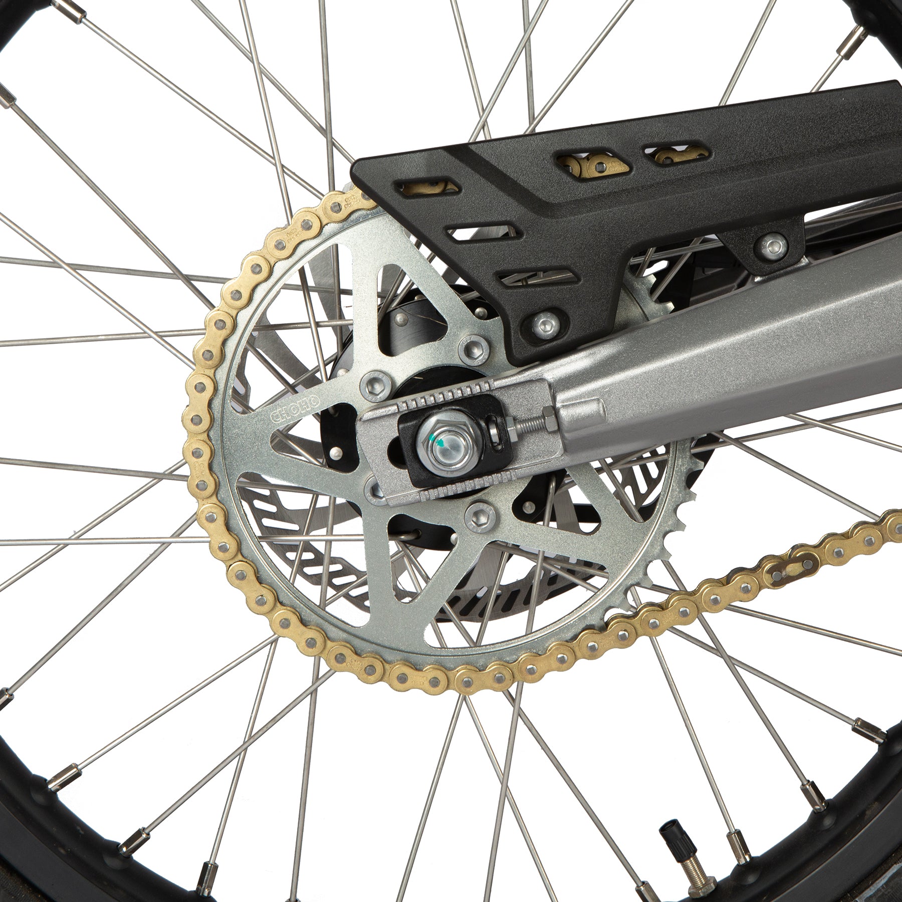 Close-up of a bicycle chain and gear system on a white background