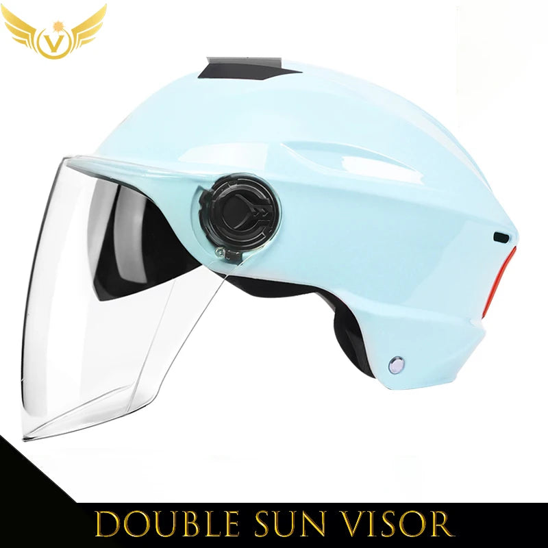 Light blue helmet with a double sun visor on a white background