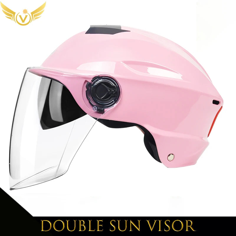 Pink helmet with a double sun visor on a white background
