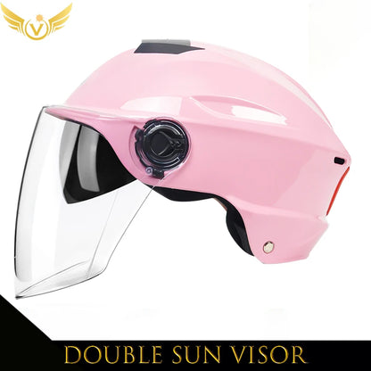 Pink helmet with a double sun visor on a white background