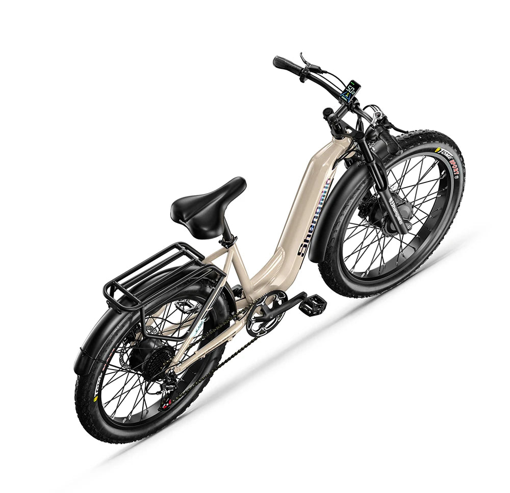 Beige electric bike with black seat on a white background