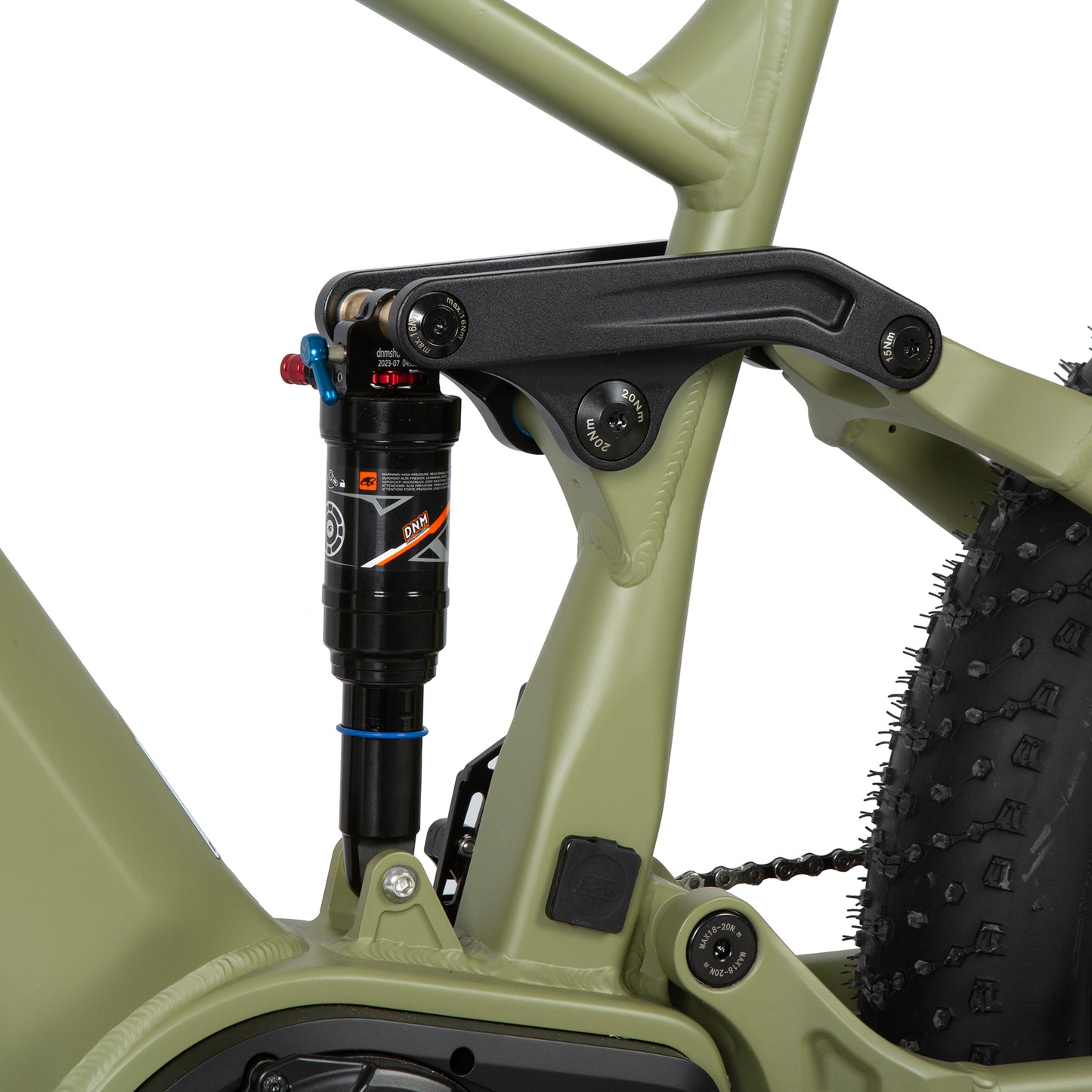 Close-up of a green electric bike with suspension fork on a white background