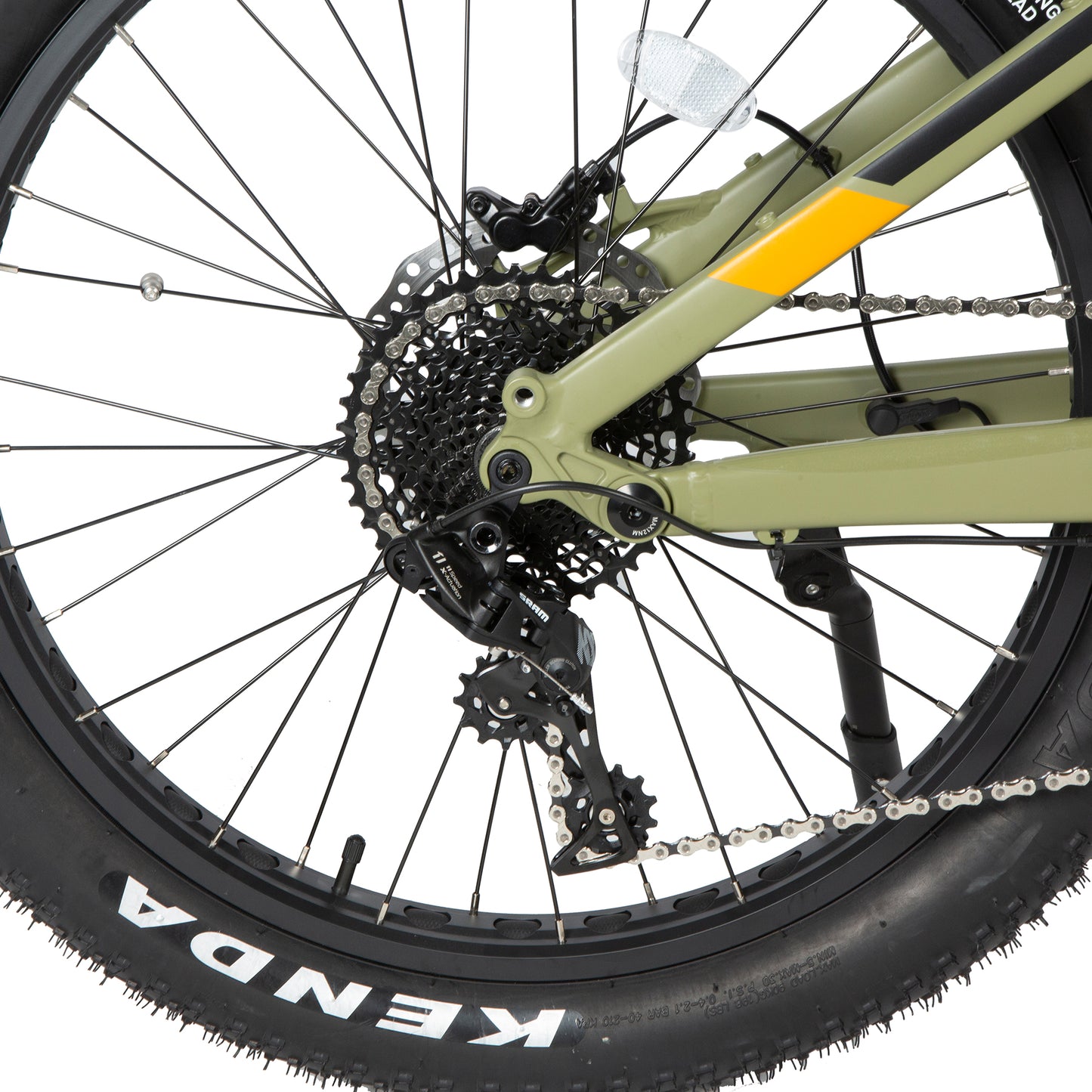 Close-up of a bicycle wheel with gear system and Kenda tire on a white background