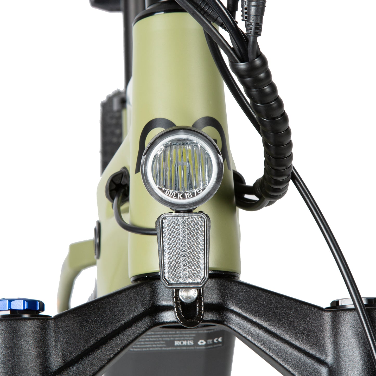 Close-up of a bicycle headlight and front light on a white background