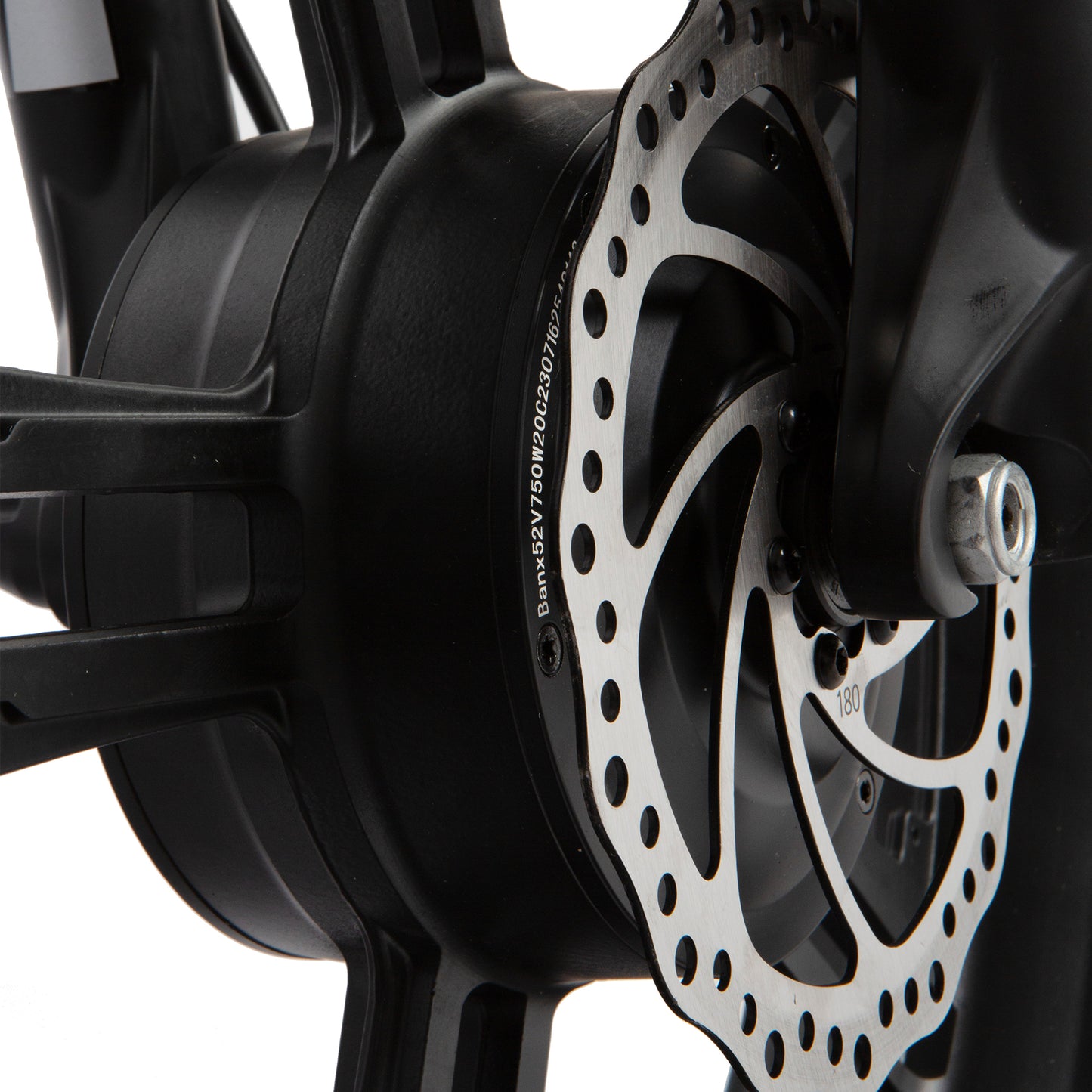 Close-up of a motorcycle disc brake with a white background