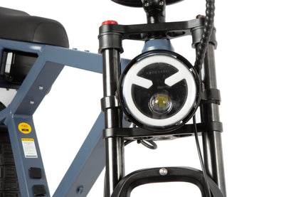 Close-up of a bicycle headlight on a white background