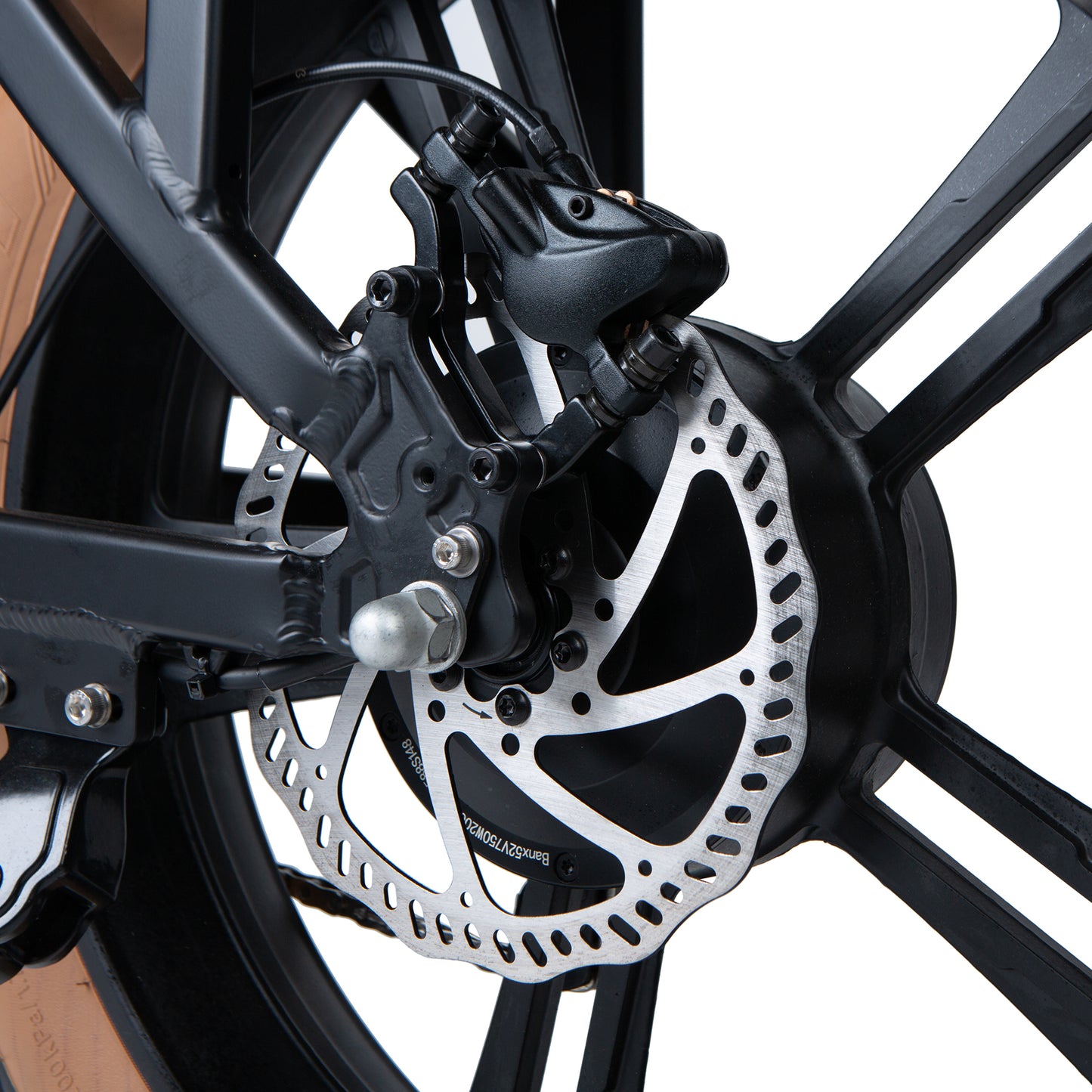 Close-up of a motorcycle wheel with disc brake system on a white background