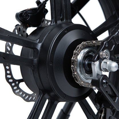 Close-up of a bicycle wheel with gear and chain mechanism on a white background